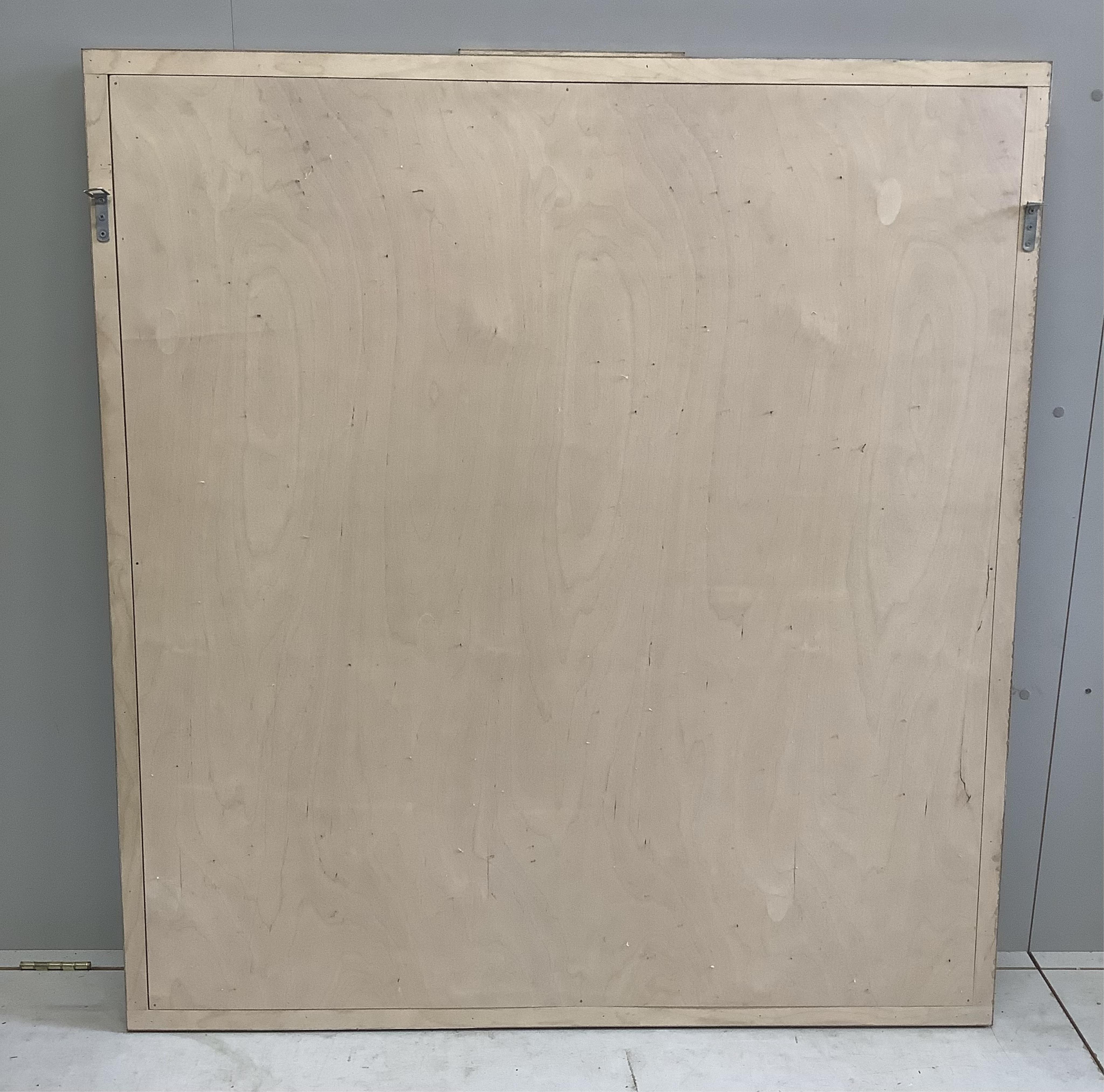 An Art Deco style sweetgum veneered rectangular overmantel mirror